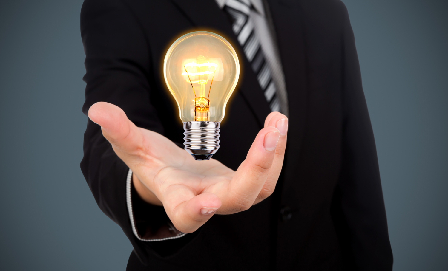 businessman-with-light-bulb-his-hand
